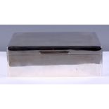 A George V silver two-division cigar box, the hinged lid with engine turned decoration, 9" wide