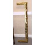 An Art Nouveau embossed brass fender curb, 44" wide