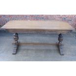 An oak "Gothic" refectory style dining table, top 36" x 72"