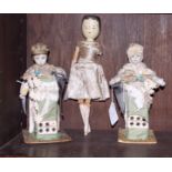 Two early 20th century pedlar dolls together with a 19th century painted wooden clothed doll