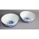 A pair of Chinese porcelain bowls decorated dragons and clouds with Dao-Guang seal mark to base,