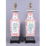 A pair of mid 20th century Chinese porcelain lamps, painted with panels of flowers with Greek key