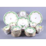 A Rockingham design bone china part teaset for eighteen (five damaged cups and saucers, etc)