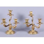 A pair of 19th century French, ormolu three-branch candelabra, 9 3/4" high approx