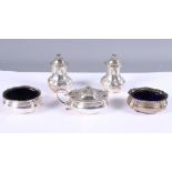 A late Victorian silver five-piece cruet set comprising two peppers, a lidded mustard jar and two