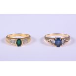 An 18ct gold, emerald and diamond dress ring and a similar 14ct gold blue stone dress ring