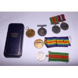 Three WWI medals and three WWII medals