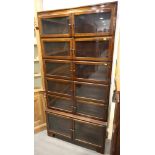 A mahogany six-section bookcase enclosed glazed panel doors, 35" wide