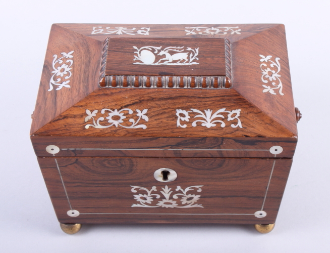 A 19th century rosewood and mother-of-pearl inlaid two-division tea sarcophagus, on ball feet, 8"