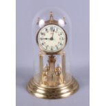 A mid 20th century brass cased anniversary clock, with glass dome, 12" high overall