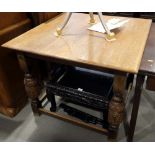 An Elizabethan design square oak dining table, on carved cup and cover supports, 36" square