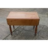 A late 19th century mahogany drop leaf table, fitted one drawer, on turned supports, 34" wide