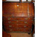 A Georgian provincial oak fall front bureau, fitted four long graduated drawers, on bracket feet,