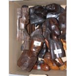 A collection of various ebony and other hardwood African figures, etc, together with an Eastern