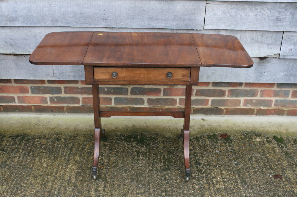 A 19th century mahogany and ebony strung "sofa" table, fitted one drawer on panel end, on splay - Image 2 of 2