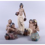 Five brown bodied Lladro figures of half-naked girls