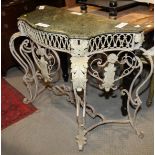 A French 19th century wrought iron serpentine front scroll-work table with marble top, 39"' wide