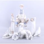 A selection of figures by Lladro, Nao and others, including three polar bears, geese, children, etc