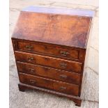 A figured walnut fall front bureau with fitted interior over four long drawers, on bracket feet, 36"