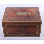 A Regency rosewood and brass inlaid work box, fitted pull-out slide, 12" wide