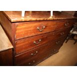 A George III mahogany chest of two short and three long graduated drawers, on bracket feet, 49"