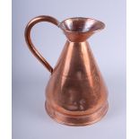 A 19th century copper gallon grain measure