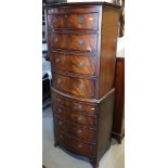 A figured mahogany bowfront chest of eight drawers, on bracket feet, 23" wide