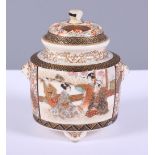 A Chinese porcelain brush rest with mountain scene and turquoise and gilt decoration, on scroll