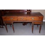 An early 19th century mahogany banded and ebony strung square piano (now a sideboard), on reeded