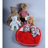 A much loved early 20th century teddy bear and a number of other soft toys, various