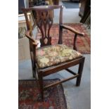 A late Georgian elbow chair with needlepoint seat (for restoration)