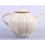 A Japanese lobed "celadon" glazed teapot, 3 3/4" high