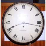 A William Cribb wall clock with 12" painted dial and oak case