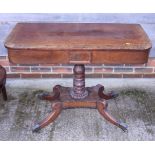 A William IV mahogany and rosewood banded fold-over top tea table, on turned column and quadruple