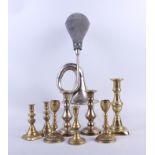 A chromed aluminium car horn, three pairs of candlesticks and two others