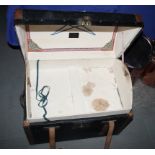 A leather dome top trunk