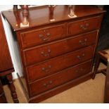 A 19th century mahogany and ebony strung chest of two short and three long drawers, on block base,