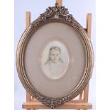 English late 19th century watercolour: portrait study of a child, 4 1/2" x 6", in oval gilt frame