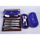 A silver spoon and fork, in fitted case, a silver spoon, in fitted case, and a set of six silver