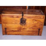 A 19th century walnut box with metal corner brackets and decorative openwork escutcheon, 42" wide