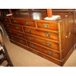 A military design yew double chest of nine drawers, 59" wide