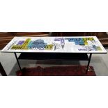 A 1960s coffee table, decorated with a London panorama after John Piper, and a polished as