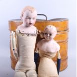 A 19th century wax head doll (for restoration), a porcelain head doll (for restoration) and a