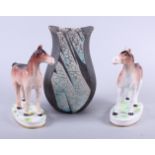 Tim Andrews: a raku oviform vase with squared sides and glazed decoration, 8" high, and a pair of