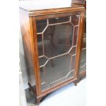 An early 20th century mahogany bookcase enclosed astragal glazed panel door, 24" wide
