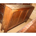 An oak vestment chest with triple panel front, 48" wide