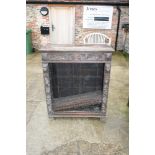 A 19th century "Gothic" carved oak open bookcase, fitted one drawer, on shaped supports, 36" wide