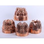 Four Victorian copper jelly moulds, various