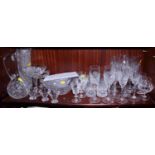 A set of six cut and engraved glass whiskey tumblers, a number of champagne glasses, a Bohemian
