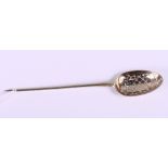 A Georgian silver gilt bottom marked mote spoon with spear head finial and pierced bowl